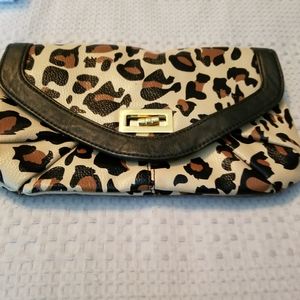 SOLDSuper cute Aldo clutch,  looks brand new... I purchased it and never use it.